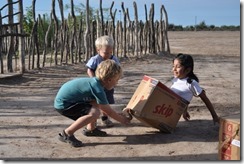 children playing with box