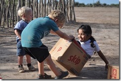 children playing with box