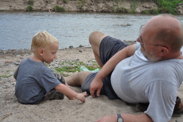 Playing on the river bank