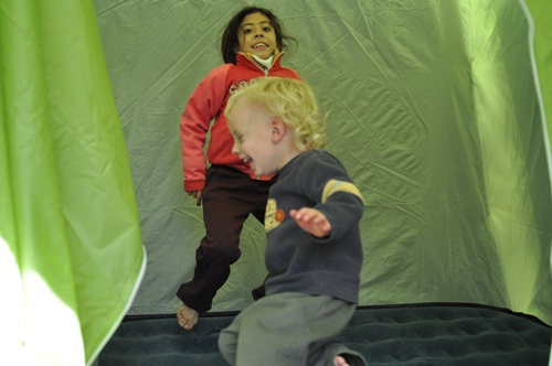 kids jumping on air bed