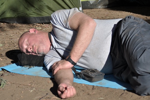 Martin asleep outside the tent