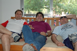 3 fat guys on a sofa