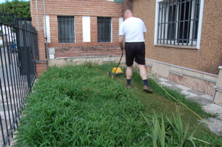 Martin cutting the grass