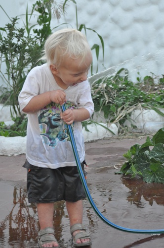 Joni drinking out of hose